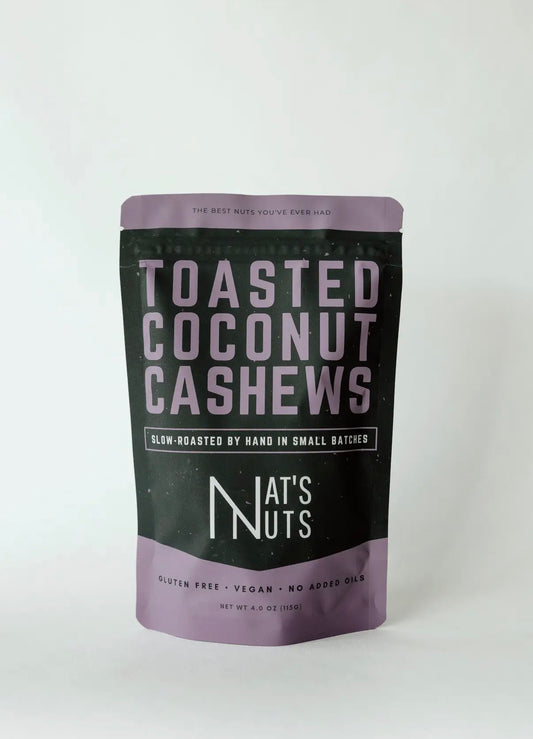 Bag of toasted coconut cashews from Nat's Nuts on a white background