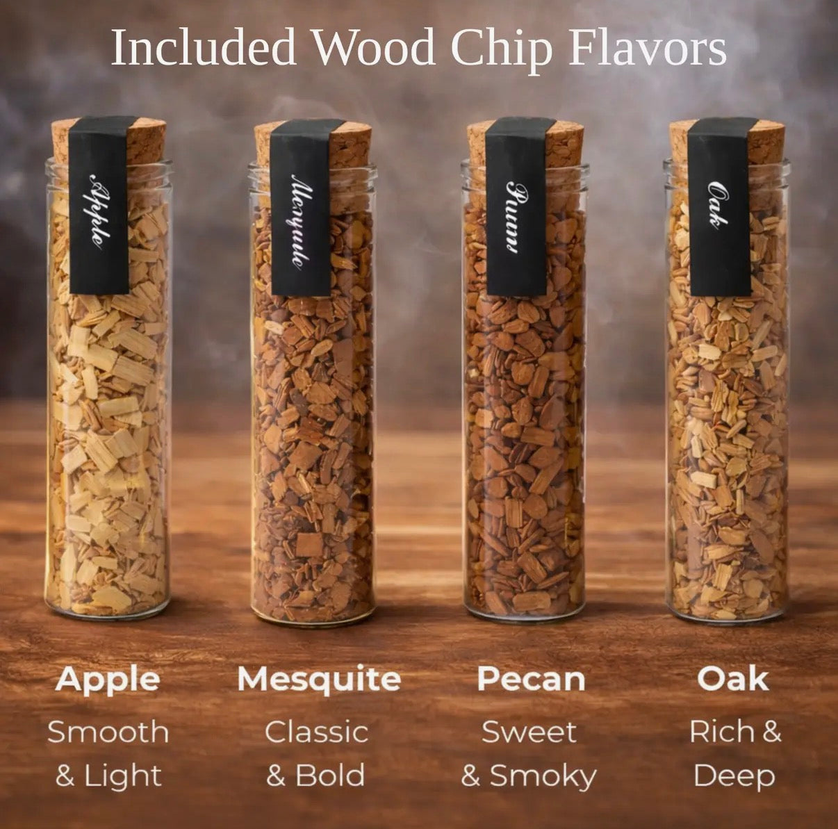 Four bottles of wood chips with labels for Apple, Mesquite, Pecan, and Oak on a wooden surface.